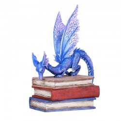 Statue bleue de dragon de livre