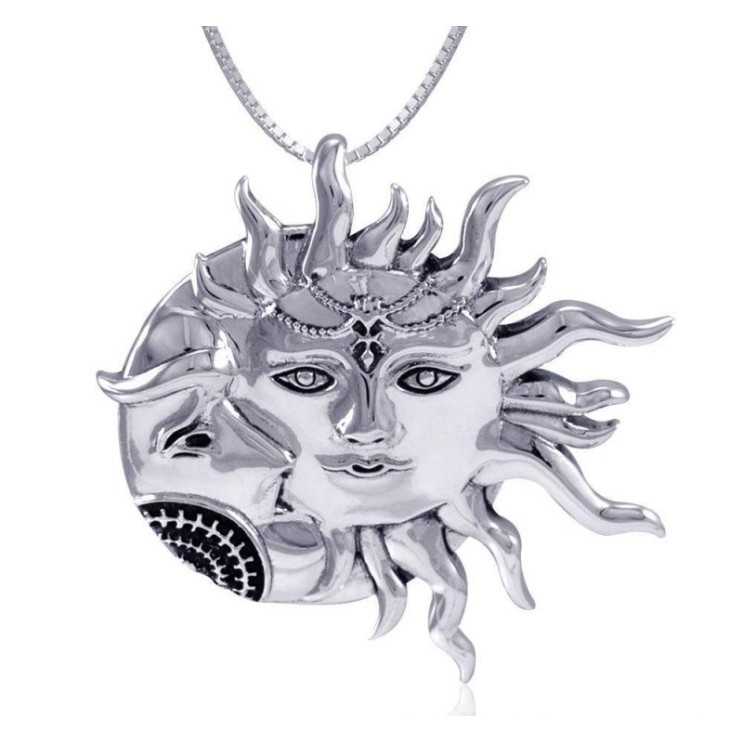 Pendentif soleil et croissant de lune, livre sterling