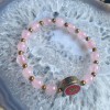 Nepalese Om with Rose Quartz Bracelet Nepalese Om with Rose Quartz Bracelet