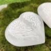 Coeurs en sélénite avec ailes d’ange Coeurs en sélénite avec ailes d’ange
